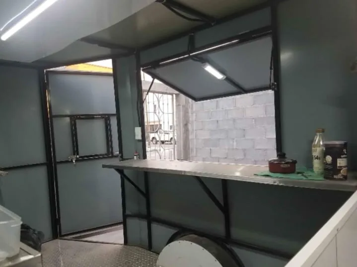 Serving counter and window seen from inside